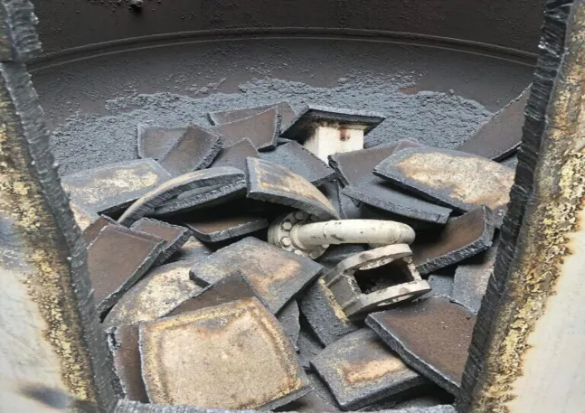 above ground tank cut into pieces